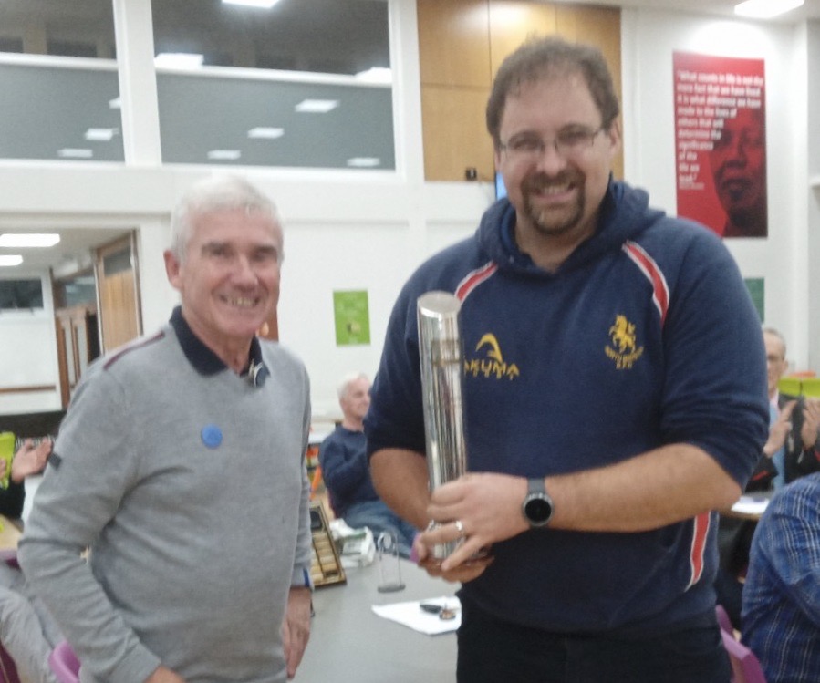 Barbershopper of the Year 2021, presented to Alex de Bruin by Crawford Anderson